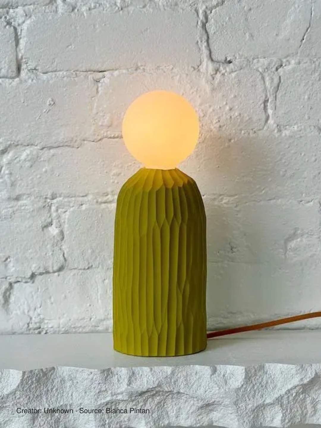 Green sculptural lamp